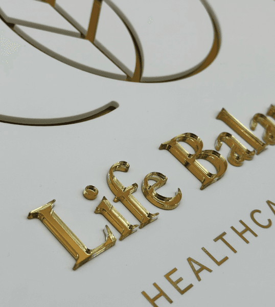 Gold dimensional logo and lettering